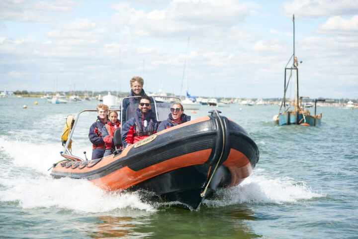 People on a power boat