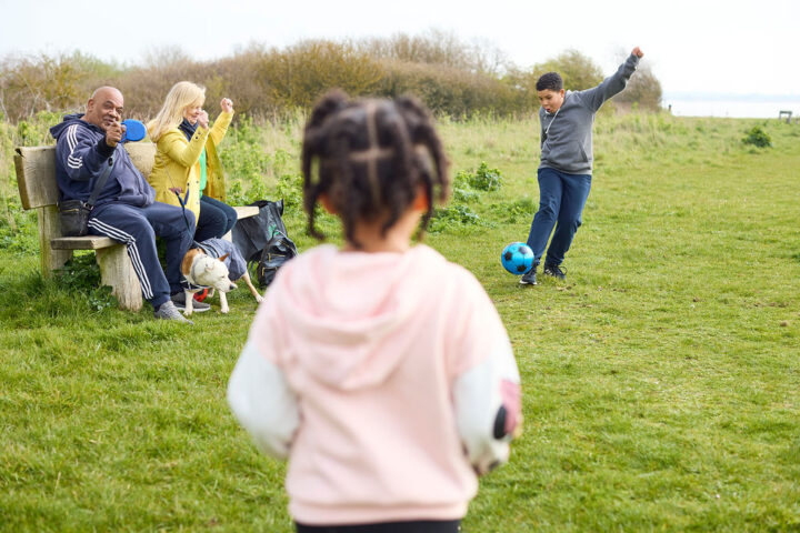 Family playing football
