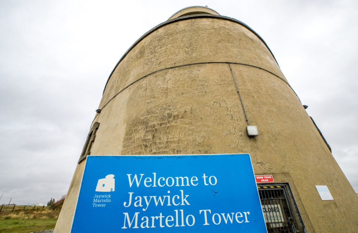 A sign welcoming visitors to Jaywick Martello Tower