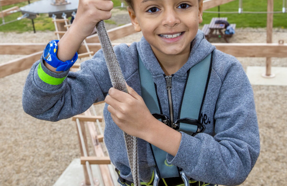 A boy using Sky Ropes