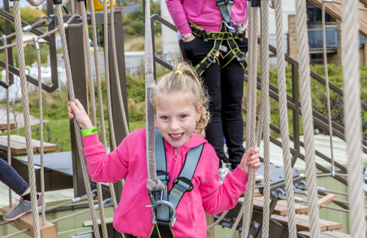 A girl and a lady using Sky Ropes