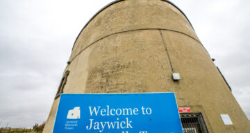 A sign welcoming visitors to Jaywick Martello Tower