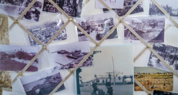 Old photographs displayed on a wall