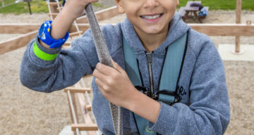 A boy using Sky Ropes