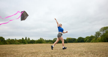 Kite flying in the picnic field