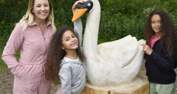 Woman and children with swan