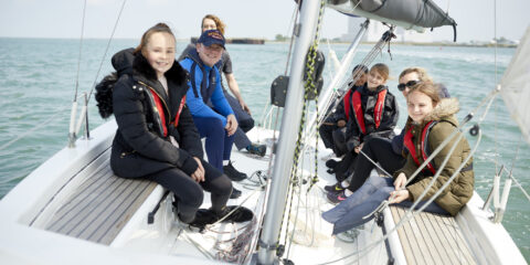 A group of children sailing