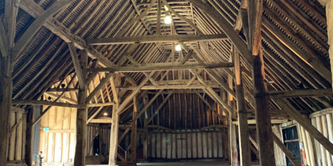 A high roofed wooden barn