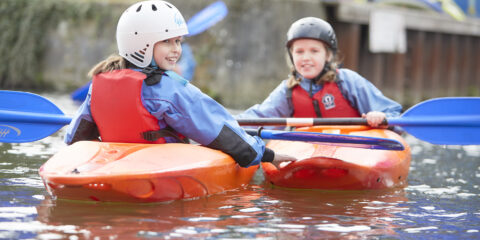 Two girls canoeing
